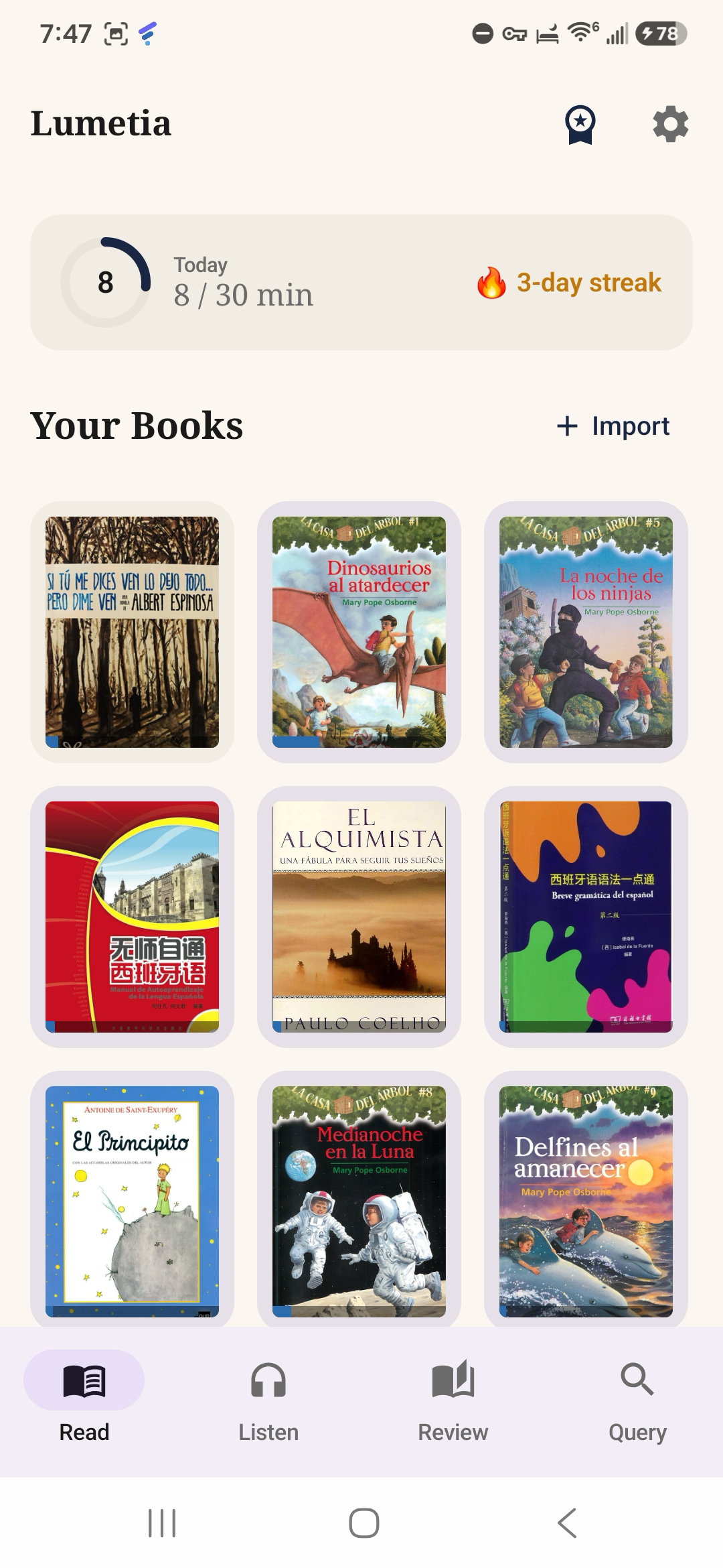 The Lumetia home screen: a daily reading goal, a streak, and your book library